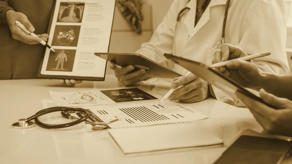 A team of doctors and medical staff meeting in a hospital